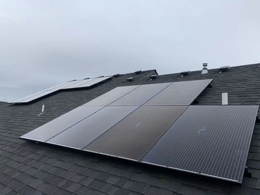 Solar panels on an asphalt-shingle roof in Oregon