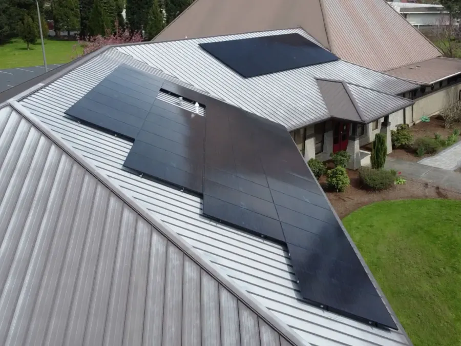 Solar panels on the metal roof of an Oregon church building