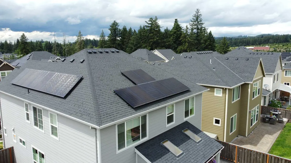 Three solar arrays on a hip roof in Oregon